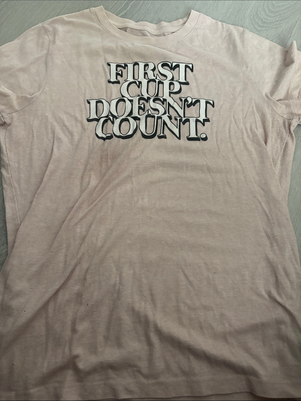 Women's Light Pink Graphic Tee - "First Cup Doesn't Count"